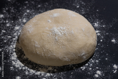 raw dough on black background, homemade recipes