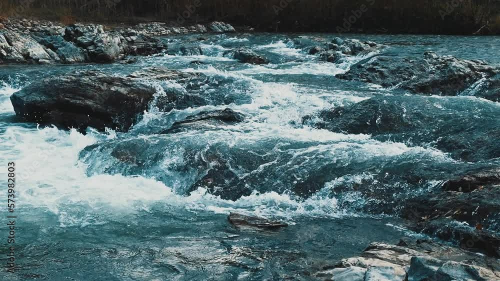 Flow of water between rocky stone Slow motion Flow of water between rocky stone Slow motion