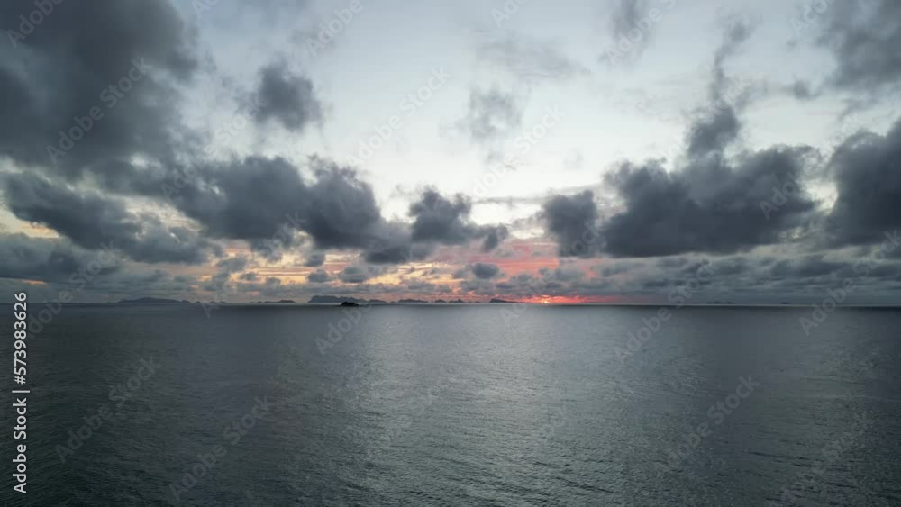 Aerial video of sunset with clouds covering the sun Aerial video of sunset with clouds covering the sun