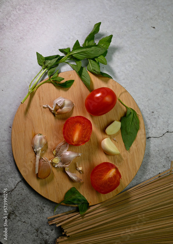 fresh tomato with garlic and basil leaf, salad ingredients