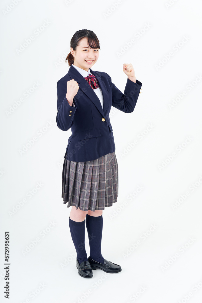 ガッツポーズをする女子高生 ガッツポーズをする女子高生