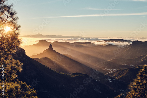 sunset in the mountains of Gran Canaria, with a sight of the Teide mountain in the back of the picture