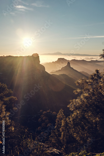 sunset in the mountains of Gran Canaria, with a sight of the Teide mountain in the back of the picture.