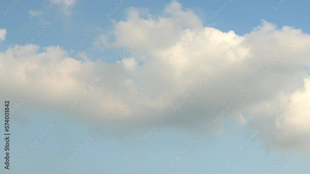 Time-lapse beautiful sky with moving clouds background. Puffy fluffy white clouds. Cloud time-lapse nature background. Cumulus cloud cloudscape timelapse. Nature weather blue sky with copy space. Time-lapse beautiful sky with moving clouds background. Puffy fluffy white clouds. Cloud time-lapse nature background. Cumulus cloud cloudscape timelapse. Nature weather blue sky with copy space.