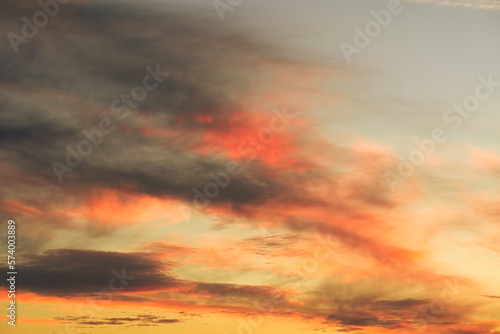Cirrus clouds sunset sky landscape with beautiful and vivid color.