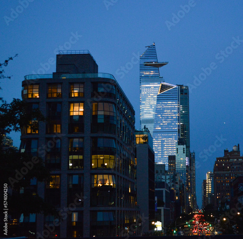 Clear night in New York City with a great view from High Line to the Edge building and Hudson Yards area.