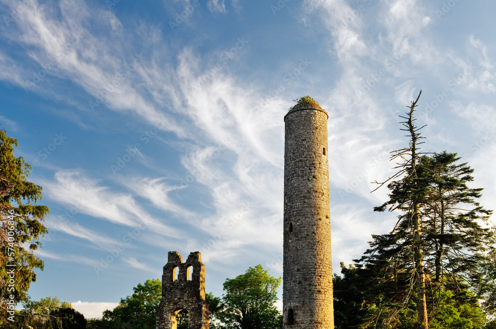Donaghmore Celtic Christian 100 foot round tower at mediaeval church site associated with St. Cassanus, County Meath, Ireland