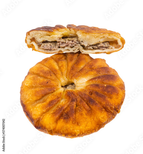 Tatar cuisine - one and half Peremech ( fried pastry stuffed with minced meat) isolated on white background photo
