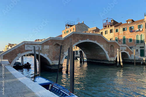 bridge over canal in sestiere of Cannaregio in Venice city at sunset