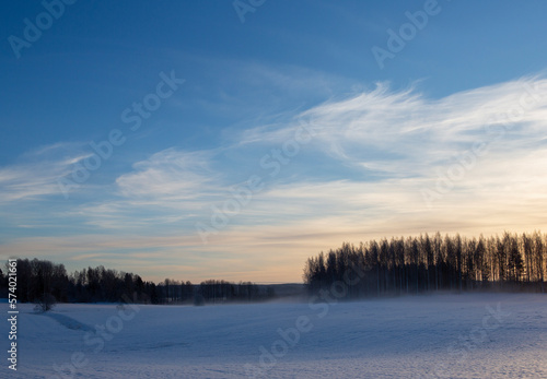 Wintry landscape wallpaper image from Finland on a cold winter day. © Jne Valokuvaus