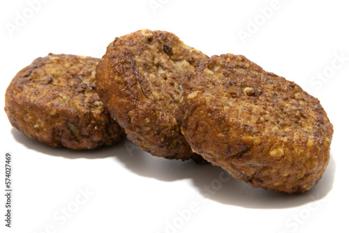 Frikadellen (squashed meatballs) isolated on a white background. German food concept. photo