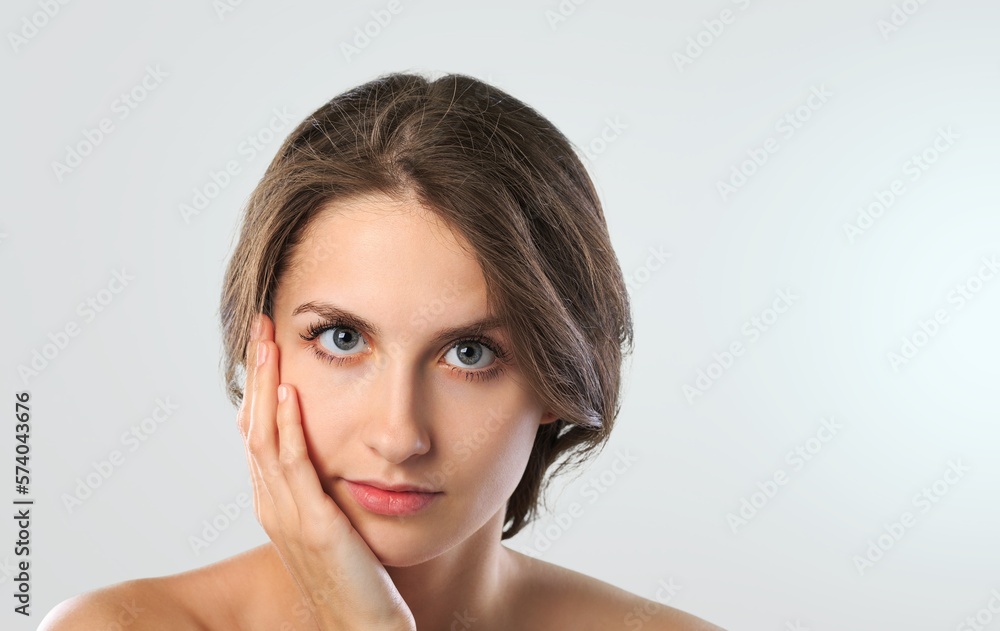Happy young woman after facial treatment. Happy young woman after facial treatment.
