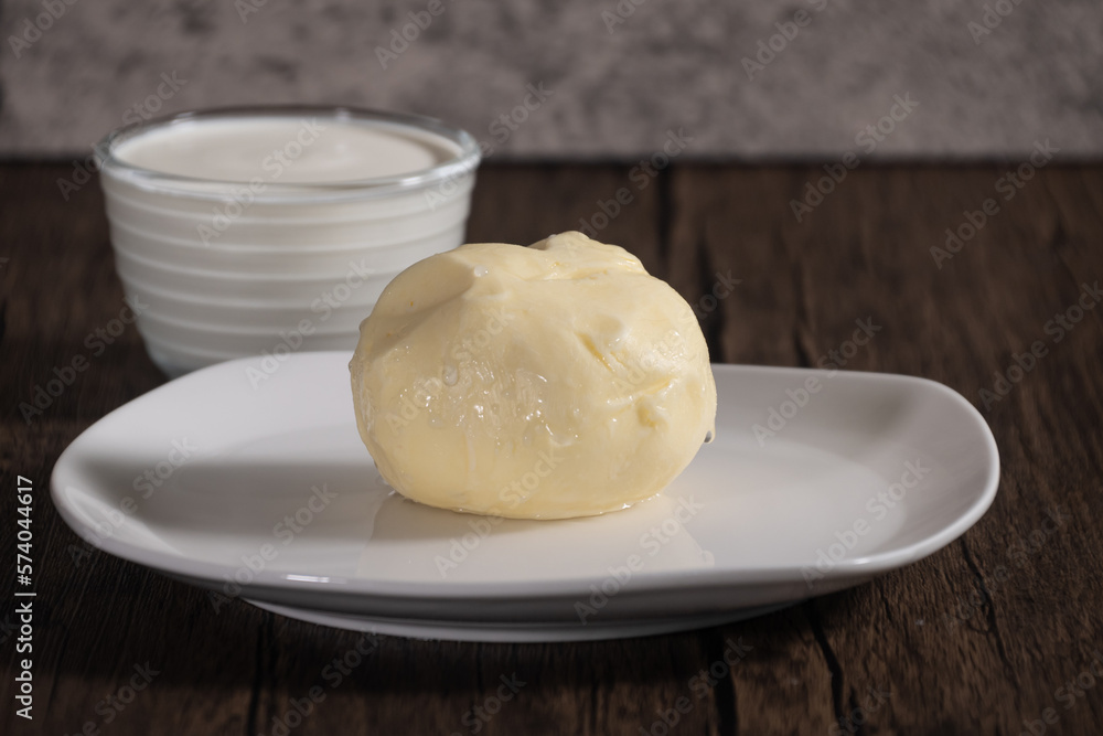 Home made butter from heavy whipping cream. Butter can be made using hand mixer or stand mixer or even with Jar beating cream on low to medium speed. Home made butter from heavy whipping cream. Butter can be made using hand mixer or stand mixer or even with Jar beating cream on low to medium speed.