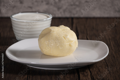 Home made butter from heavy whipping cream. Butter can be made using hand mixer or stand mixer or even with Jar beating cream on low to medium speed.