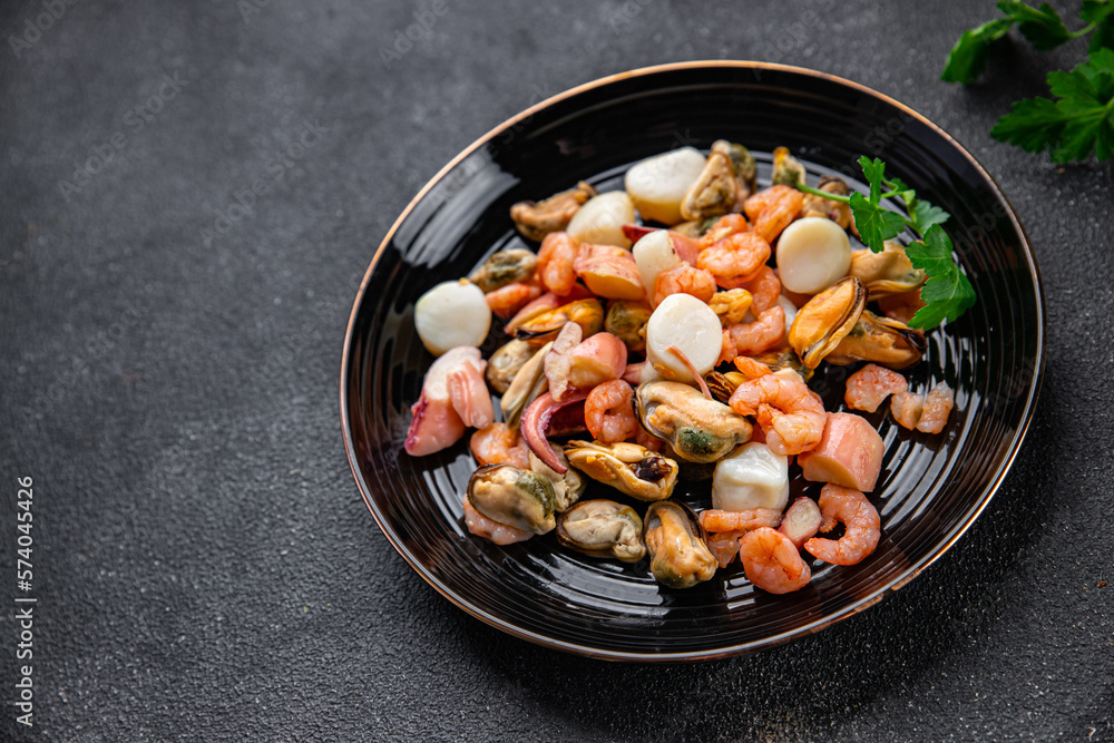 seafood salad shrimp, mussel, scallop, octopus healthy meal food snack on the table copy space food background rustic top view pescatarian diet seafood salad shrimp, mussel, scallop, octopus healthy meal food snack on the table copy space food background rustic top view pescatarian diet