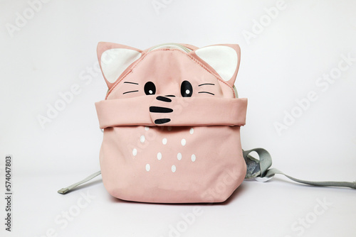 Wallpaper Mural a cute pink backpack with a kitty paw closes its mouth. bullying at school Torontodigital.ca