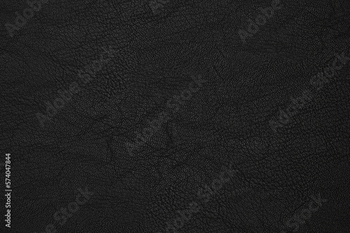 black artificial leather with waves and folds on PVC base