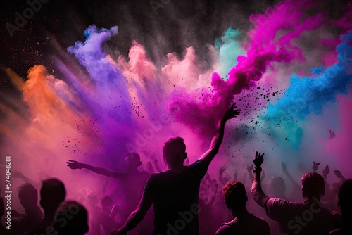Holi Festival celebration: Bright colorful powders in the air. People silhouettes. © oleksandr.info