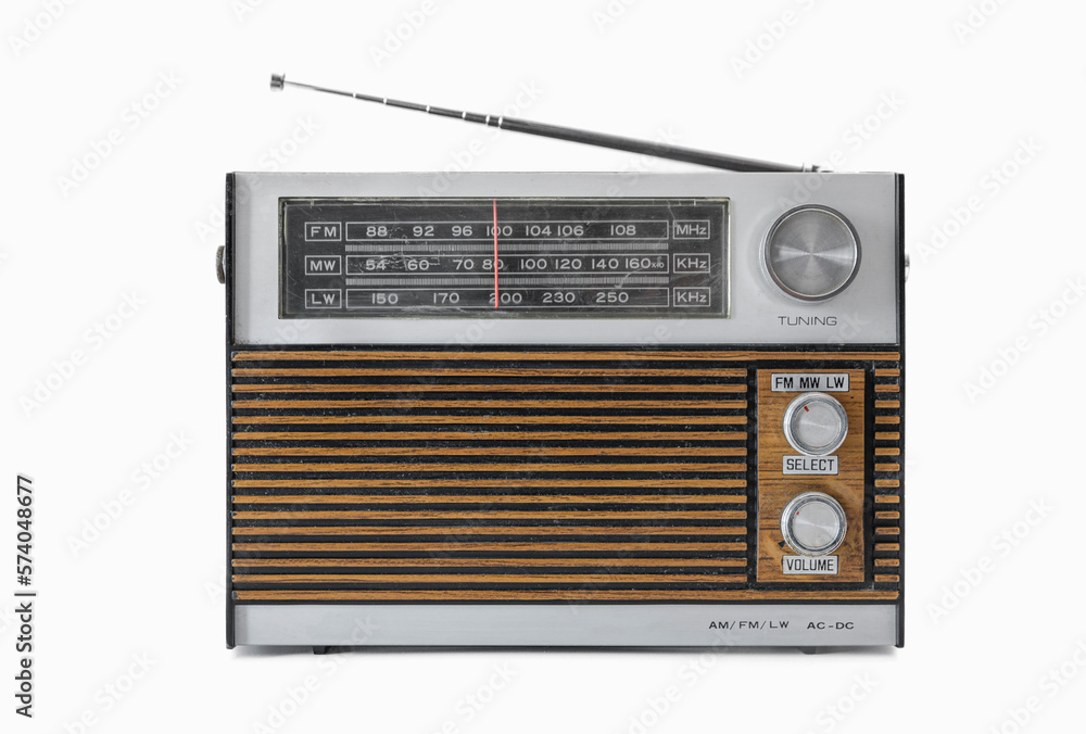 Fotka „Authentic 70s radio receiver. Front view. Isolated on white  background. Traces of time and scuffs on the body“ ze služby Stock | Adobe  Stock