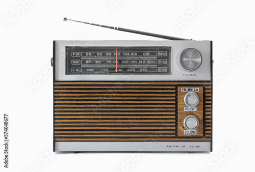 Authentic 70s radio receiver. Front view. Isolated on white background. Traces of time and scuffs on the body