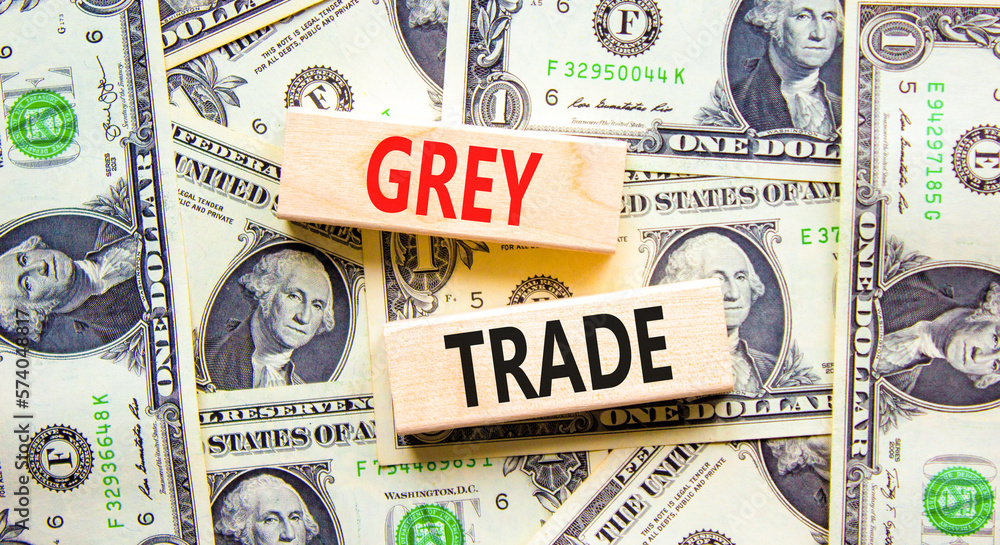 Grey trade symbol. Concept words Grey trade on wooden block. Beautiful background from dollar bills. Dollar bills. Business grey trade concept. Copy space.