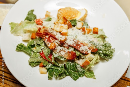 Healthy Grilled Chicken Caesar Salad with Cheese and Croutons