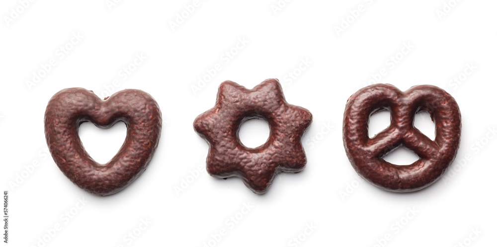 Sweet chocolate heart, star and pretzel isolated on white background. Sweet chocolate heart, star and pretzel isolated on white background.