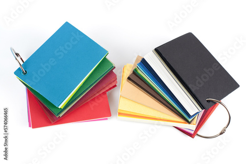 Catalogs of colored paper, cardboard, designer paper for choosing a basis for printing. Samples of paper in the polygraphic industry photo