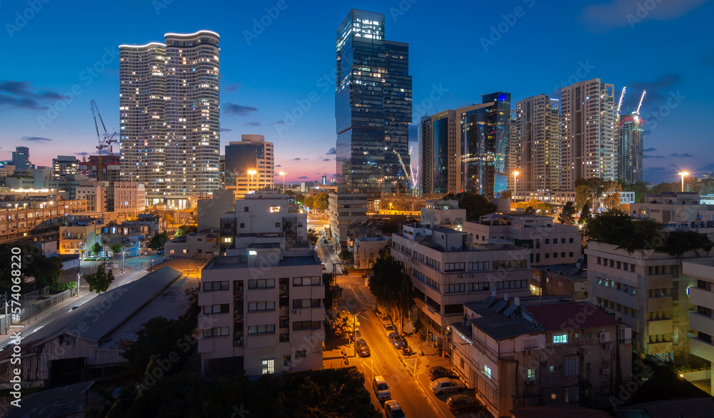 Tel Aviv night view: modern skyscrapers and dormitory quarters Tel Aviv night view: modern skyscrapers and dormitory quarters