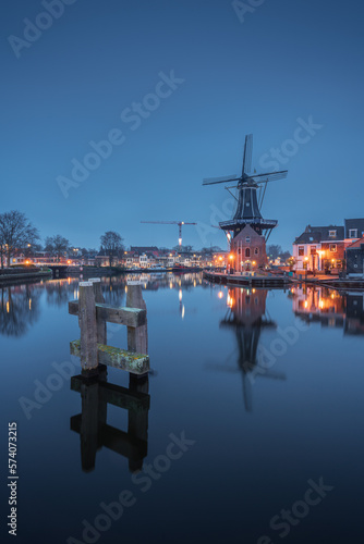 Windmill De Adriaan at night in Haarlem, Netherlands