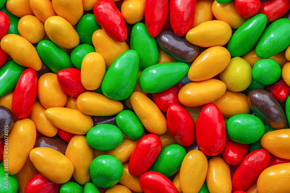 Candy seeds in multi colored sweet glaze in bulk, grains kernels seeds, close-up, wallpaper background, full depth of field. Candy seeds in multi colored sweet glaze in bulk, grains kernels seeds, close-up, wallpaper background, full depth of field.