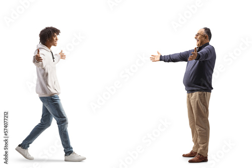 African american young man meeting a happy mature caucasian man
