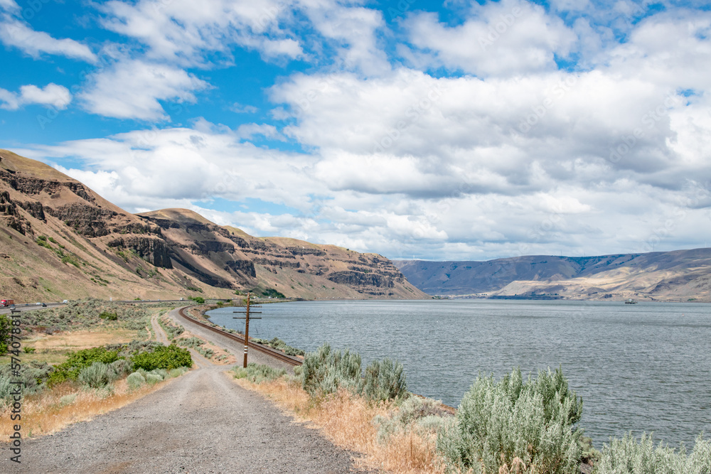 Dirt Road and Train Tracks Running Along the East Columbia River Gorge Dirt Road and Train Tracks Running Along the East Columbia River Gorge
