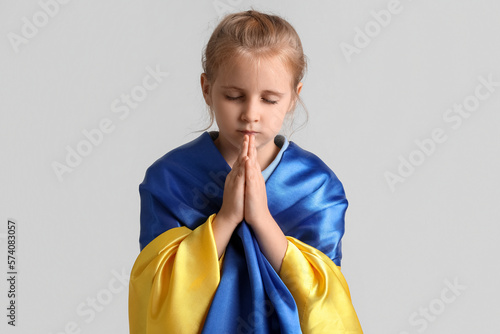 Little girl with flag of Uk...