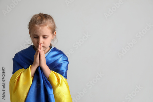 Little girl with flag of Uk...