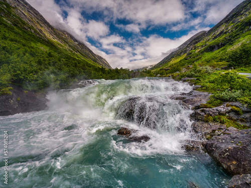 Hastholmen, Norway, snow in the mountains even though it's the month of July	