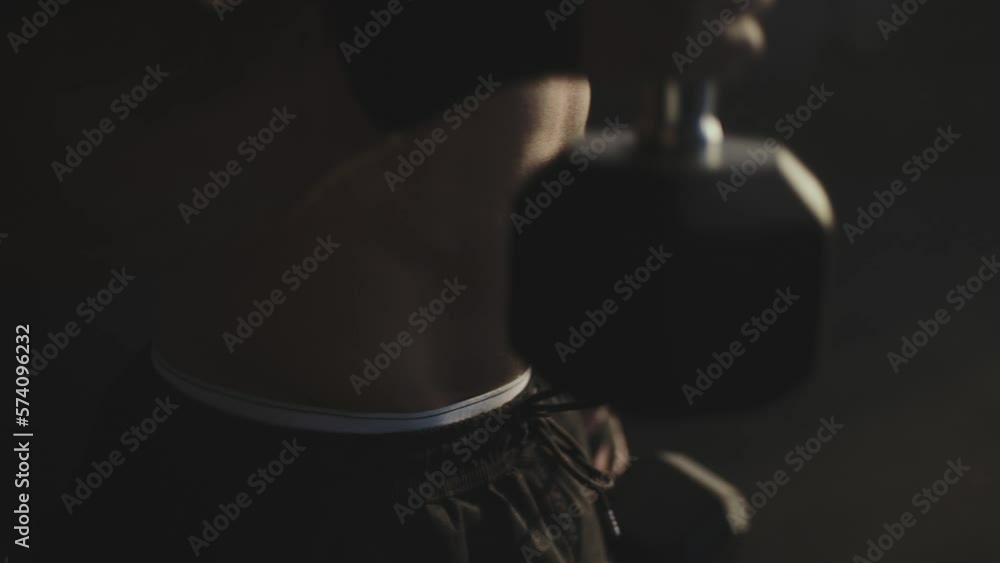 Muscular young man doing dumbbell workout for triceps at sports gym. Concept of health and fitness close-up Muscular young man doing dumbbell workout for triceps at sports gym. Concept of health and fitness close-up
