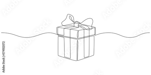 One continuous line drawing of Christmas Present box. Wrapped gift surprise and festive present with ribbon and bow icon in simple linear style. Editable stroke. Doodle outline vector illustration