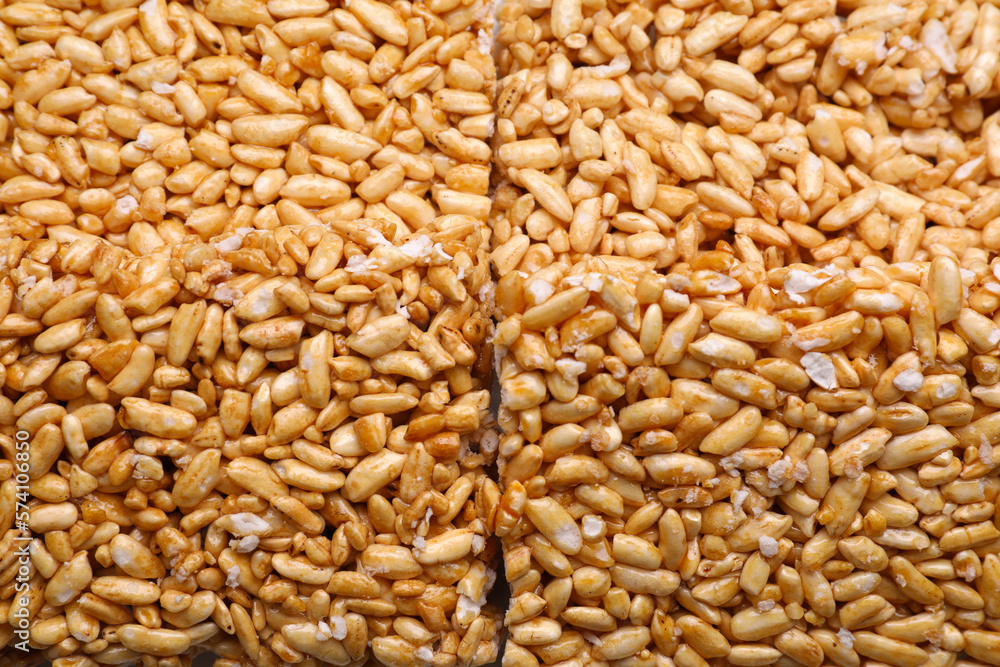 Puffed rice bars (kozinaki) as background, top view Puffed rice bars (kozinaki) as background, top view
