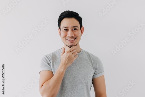 Warm smile face of kind asian man isolated white background. Happiness concept.