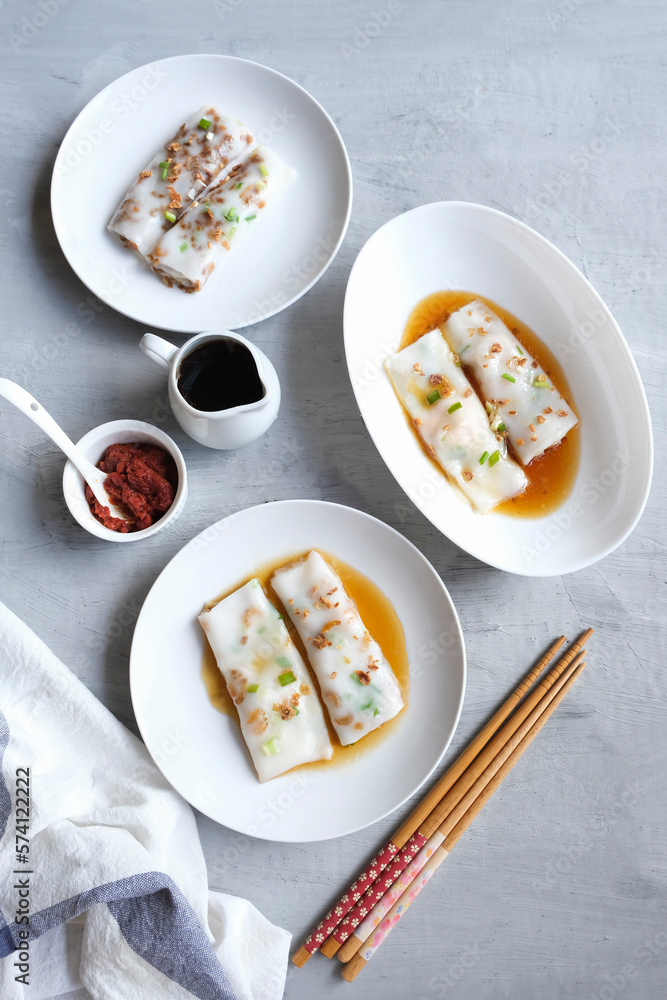 Homemade light snacks. Steamed Cheung Fan aka Rice Noodle Roll. Mixed rice flour with tapioca and glutinous flour with water and steam in flat rectangular pan with pan-fry dried shrimps