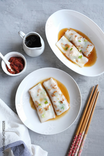 Homemade light snacks. Steamed Cheung Fan aka Rice Noodle Roll. Mixed rice flour with tapioca and glutinous flour with water and steam in flat rectangular pan with pan-fry dried shrimps