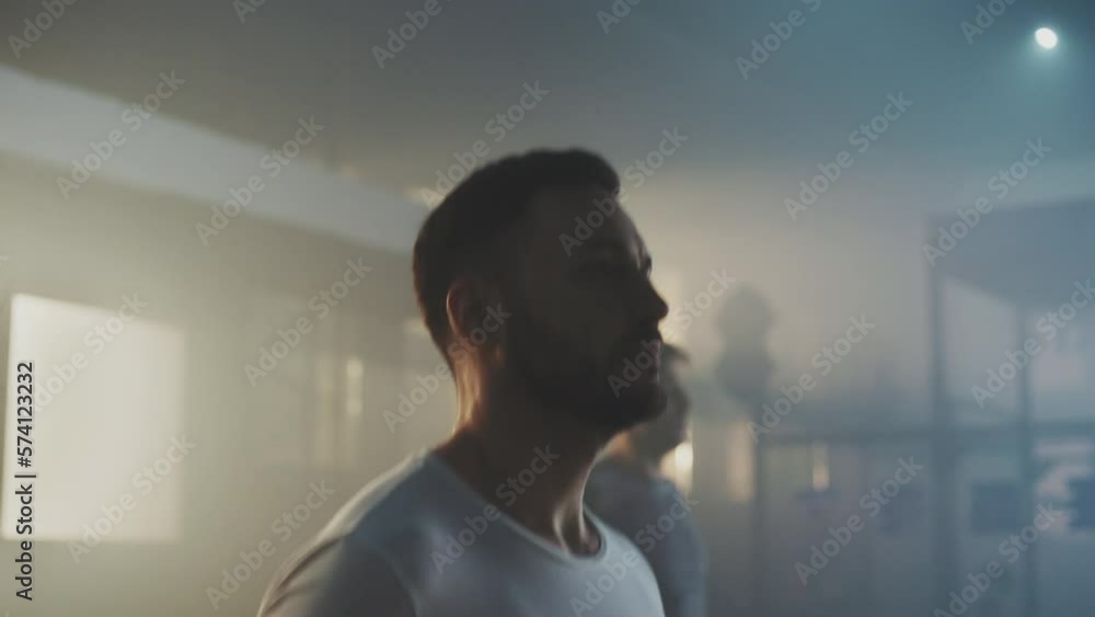 Young adult sporty caucasian people performing skipping rope workout in functional gym, slow-motion shot. 4K Young adult sporty caucasian people performing skipping rope workout in functional gym, slow-motion shot. 4K
