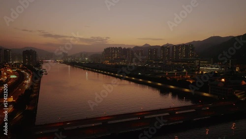Wallpaper Mural aerial night sky view of modern Chinese metropolitan cityscape Hong Kong illuminated at night with modern skyscraper building and sunset golden hours, cinematic aerial footage nightlife concept  Torontodigital.ca