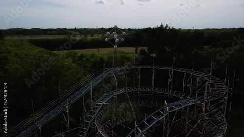 Establisher aerial view of abandoned LunaPark in Limbiate, Italy, circle pan photo