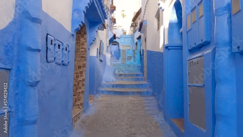 Gimbal-in of narrow street of Blue medina of Chechaouen, Morocco  photo