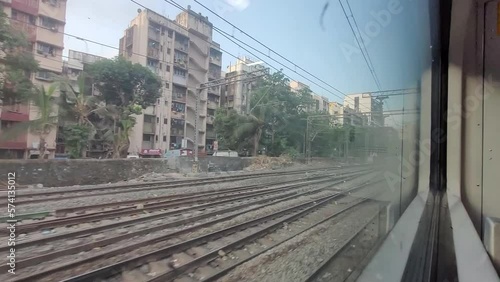 Mumbai AC local train crossing Vikhroli. photo