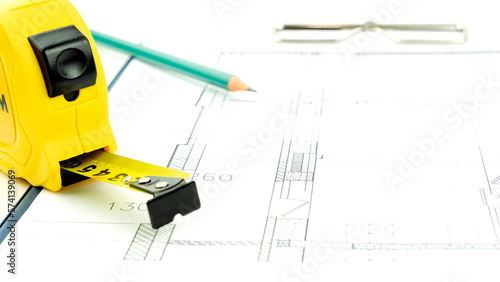 House keys and roulette on the drawings. the concept of construction and purchase of new housing