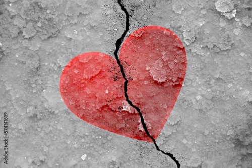 Shape of red heart on cracked texture