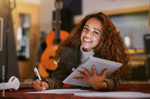 Canvas Print Black woman, portrait smile and tablet writing music in studio for audio track, content creation or development